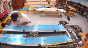 EA: Page 9-15,18. Attach Trim Tab Hinge, Insert Trailing Edge Wedge (Page 9-14)