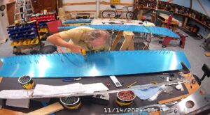 TC: Page 10-7 Step 7. Match drill #40 the right skin and the F-1047C, D & E Stiffeners.