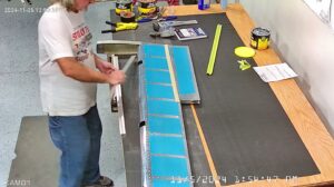 EA: Page 9-15,18. Attach Trim Tab Hinge, Insert Trailing Edge Wedge (Page 9-14)