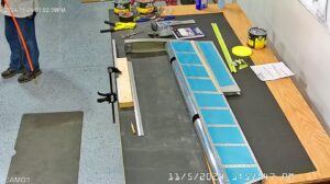 EA: Page 9-15,18. Attach Trim Tab Hinge, Insert Trailing Edge Wedge (Page 9-14)