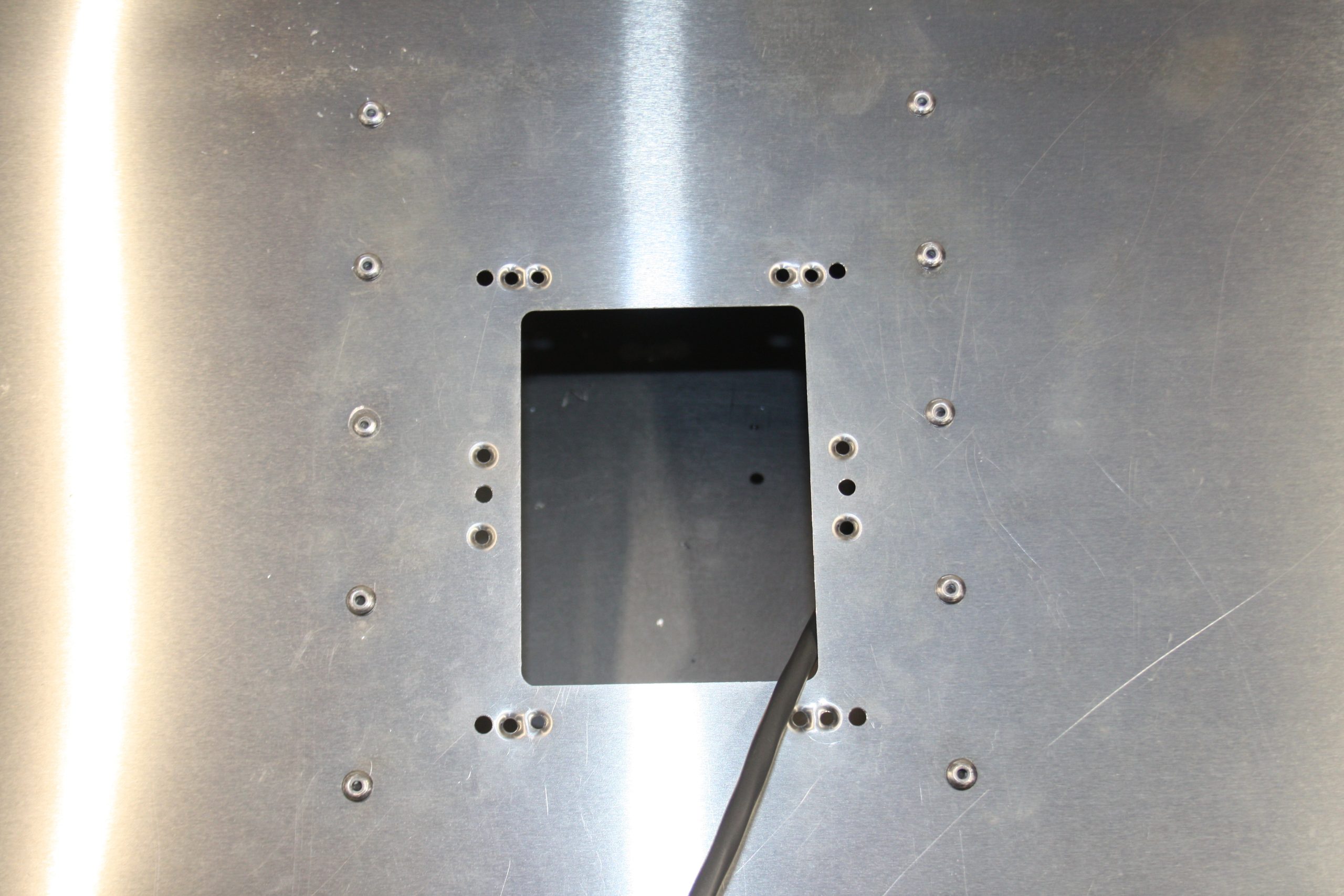 Modified Trim Tab Cover Plate Attachment
