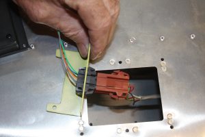 Trim tab connector and mounting plate I made to hold the connector so it doesn't bounce around inside the elevator.