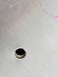 Two misaligned holes between fuselage side skin and SD75F18-4