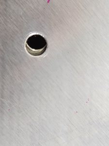 Two misaligned holes between fuselage side skin and SD75F18-4