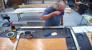 Assembling the top channel of the 750 SD fuselage and rear wing attach brackets