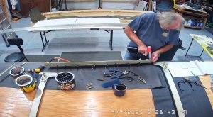 Assembling the top channel of the 750 SD fuselage and rear wing attach brackets
