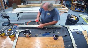 Assembling the top channel of the 750 SD fuselage and rear wing attach brackets