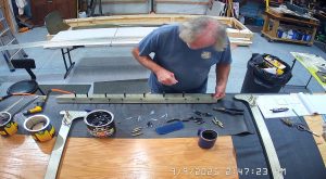 Assembling the top channel of the 750 SD fuselage and rear wing attach brackets