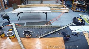 Riveting the side channel doubler in place