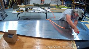 Riveting the diagonal and the vertical angles to the right side fuse;age skin SD75F1-3 and LS75F1-4A