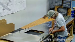 Completing bottom skin A4 rivetting
