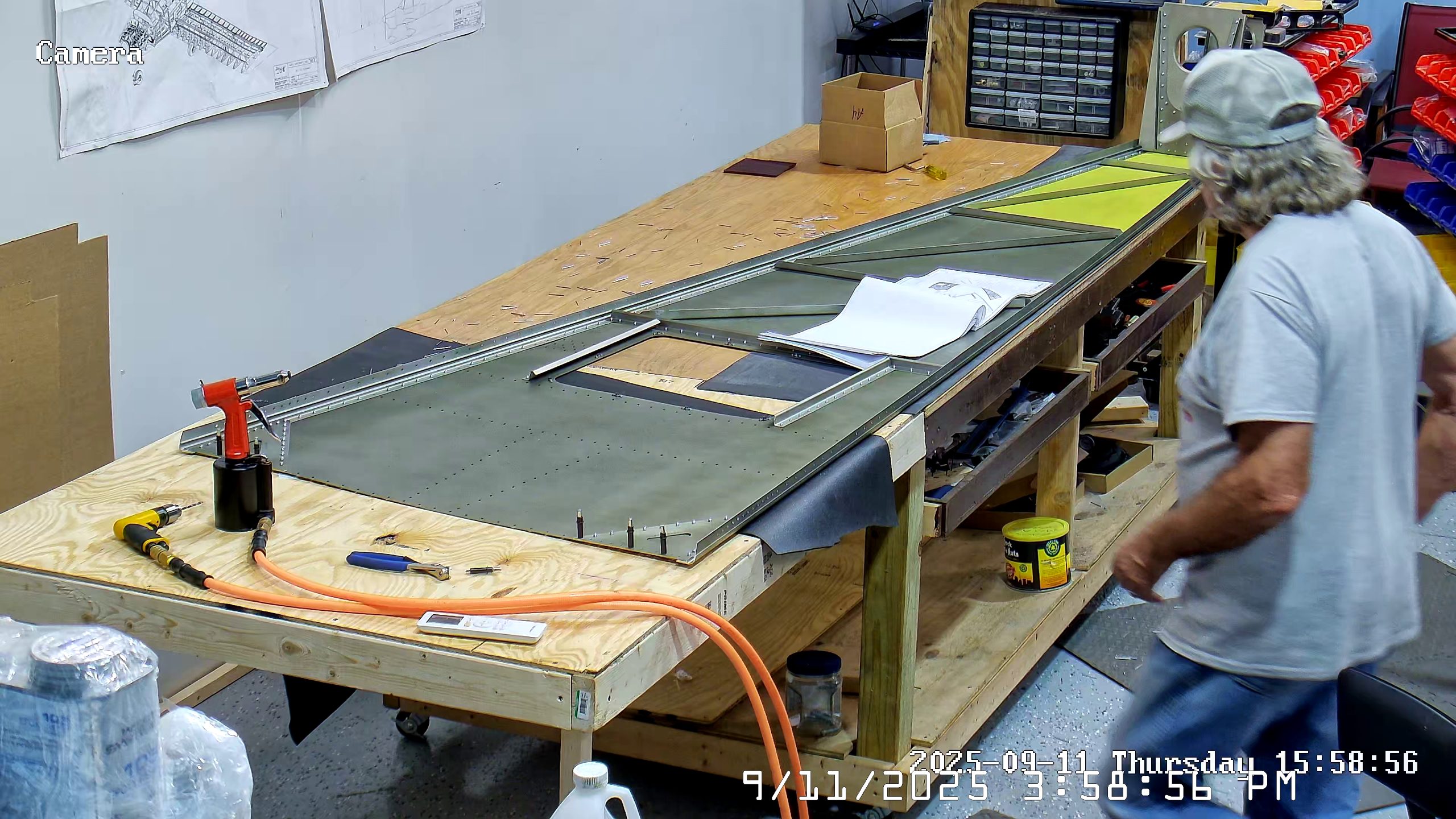 Riveting the forward bottom fuselage skin and gussets