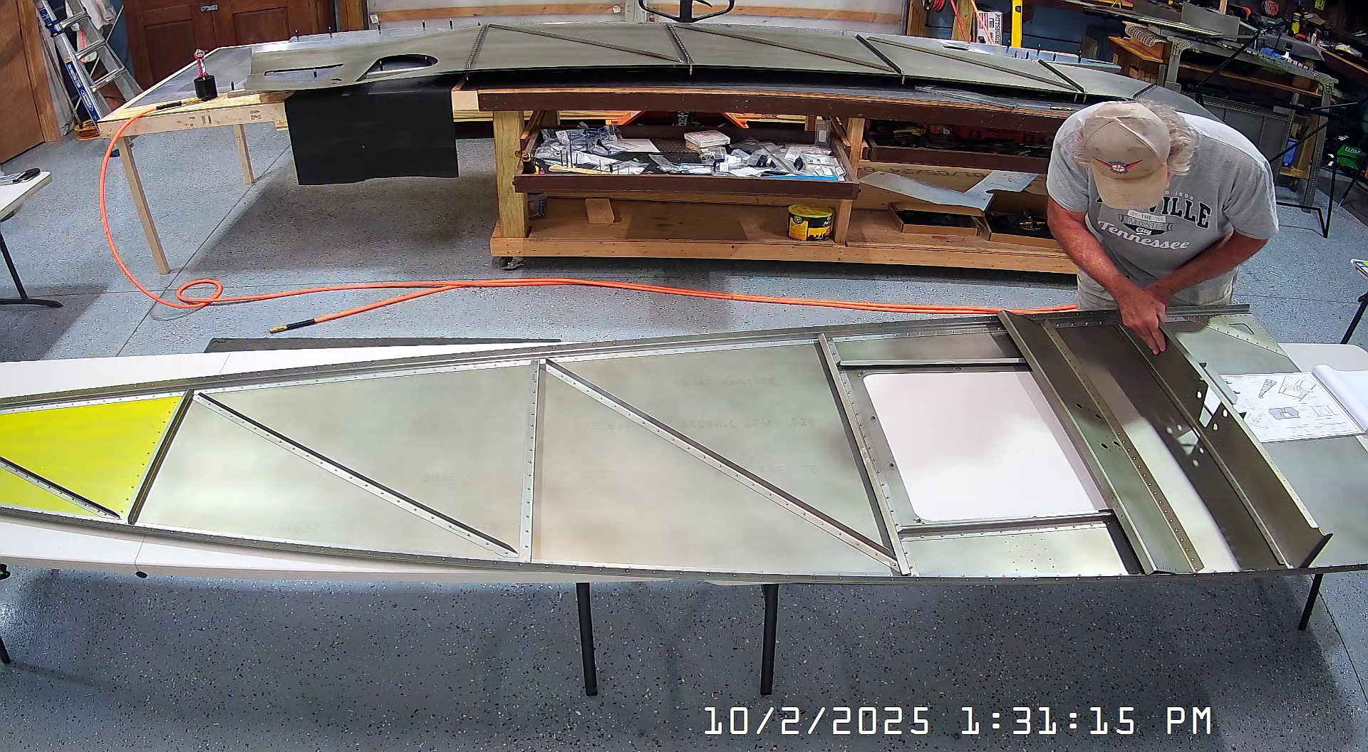 Test fitting the jump seat front and rear channels on the fuselage floor, and the back panel