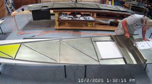 Test fitting the jump seat front and rear channels on the fuselage floor, and the back panel