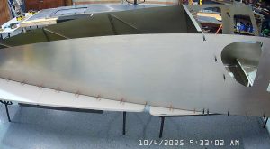 Attaching the sides of the fuselage to the bottom with clecos
