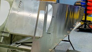 Attaching the sides of the fuselage to the bottom with clecos