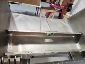 Building the Zenith 750 SD fuselage FR-04 jump seat channels and linear actuator mount