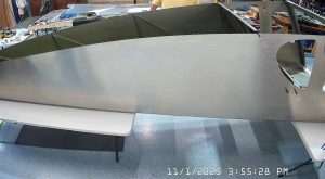 Riveting the side channels of the 750 SD baggage back to the side skins.