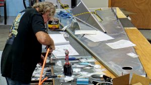 Building the Zenith 750 SD fuselage FR-04. Riveting the jump seat channels and linear actuator mount bracket