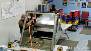 Zenith 750 SD FR-09 riveting the top skin to the channels & rear wing attachment frame.