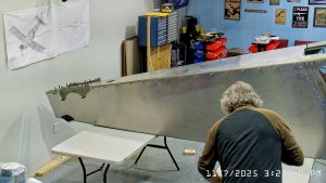 Installing A4 rivets to hold side skins to 750 SD top skin longerons