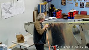 Installing A4 rivets to hold side skins to 750 SD top skin longerons