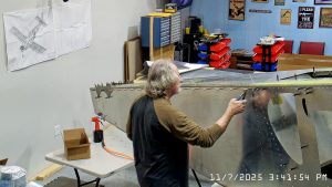 Installing A4 rivets to hold side skins to 750 SD top skin longerons